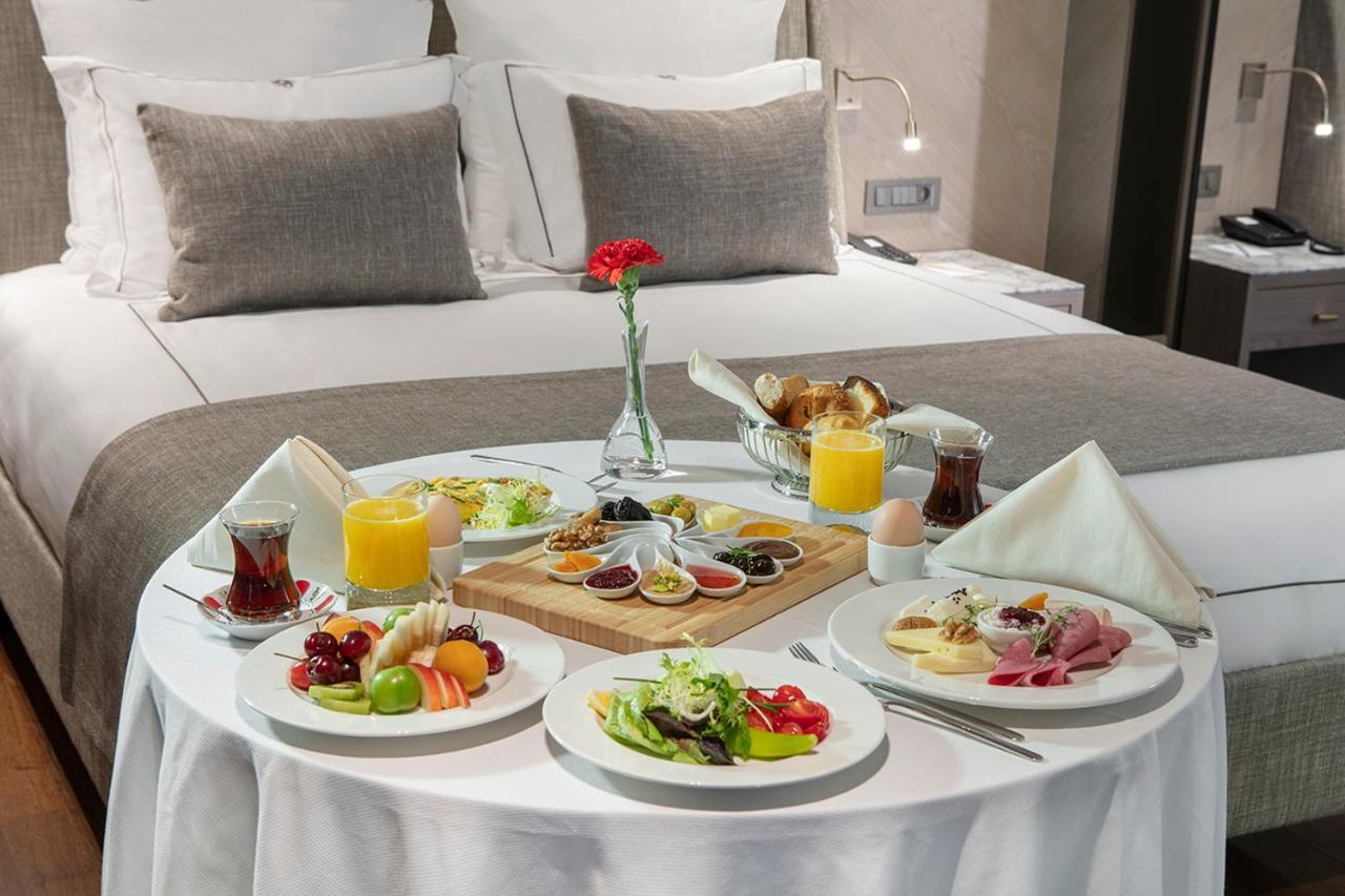 Melas Hotel Estambul Exterior foto Room service